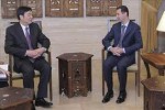 El presidente de Siria, Bashar al-Assad y el vicecanciller chino, Zhai Jun.