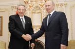 Raúl con el mandatario Vladimir Putin, quien pidió transmitir un saludo a Fidel.(foto: Estudios Revolución)