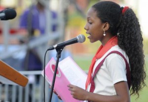 Wendy Ferrer, estudiante de 6to grado de la escuela primaria Carlos Rodríguez, interviene en el Acto Central Nacional por el 26 de Julio en Artemisa.