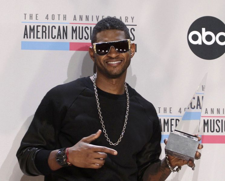 Usher, estrella del R&B laureado con varios premios Grammy.