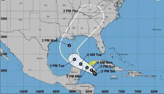 El centro de la depresión se pronostica que permanezca al sur del occidente de Cuba este domingo. 