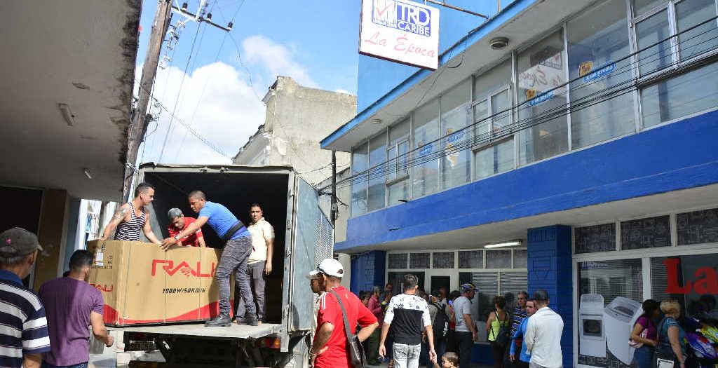 sancti spiritus, economía cubana, mlc, moneda libremente convertible, tarjetas magnéticas, cadena de tiendas caribe